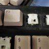 Commodore Amiga 500/2000 Key - Space Invaders Style with white/spring attachment
