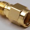 Coaxial adapter, 50 Ω, RP-SMA plug to SMA socket, straight, 0419101