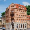 Dom narożny Markt 1 Zestaw do złożenia Auhagen 13334 TT 1 szt.