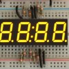 Yellow 7-segment clock display - 0.56