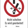 Warning sign, text: "Es wird gearbeitet", (W) 65 mm, plastic, 080.16-6-92X65-H